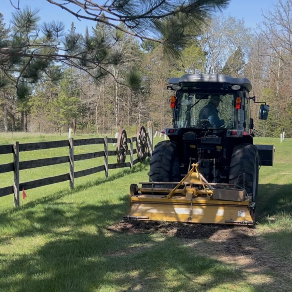 tractor tilling soil